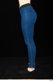 Ellie Springlare black sneakers blue jeans dressed leg lower body…